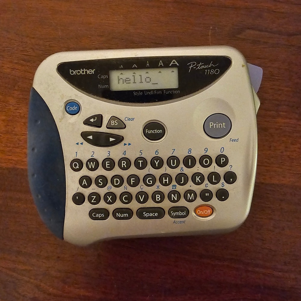 Brother P-Touch 1180 Label Maker Handheld Thermal Printer Silver Blue PT-1180